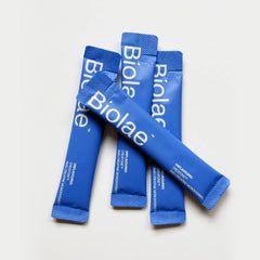 Blue Biolae creatine sachets on a white background